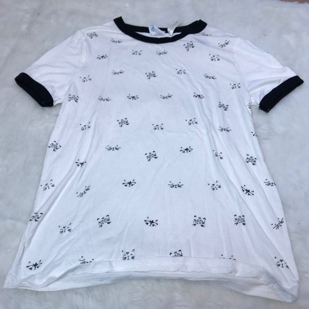 White shirt with cat faces all over